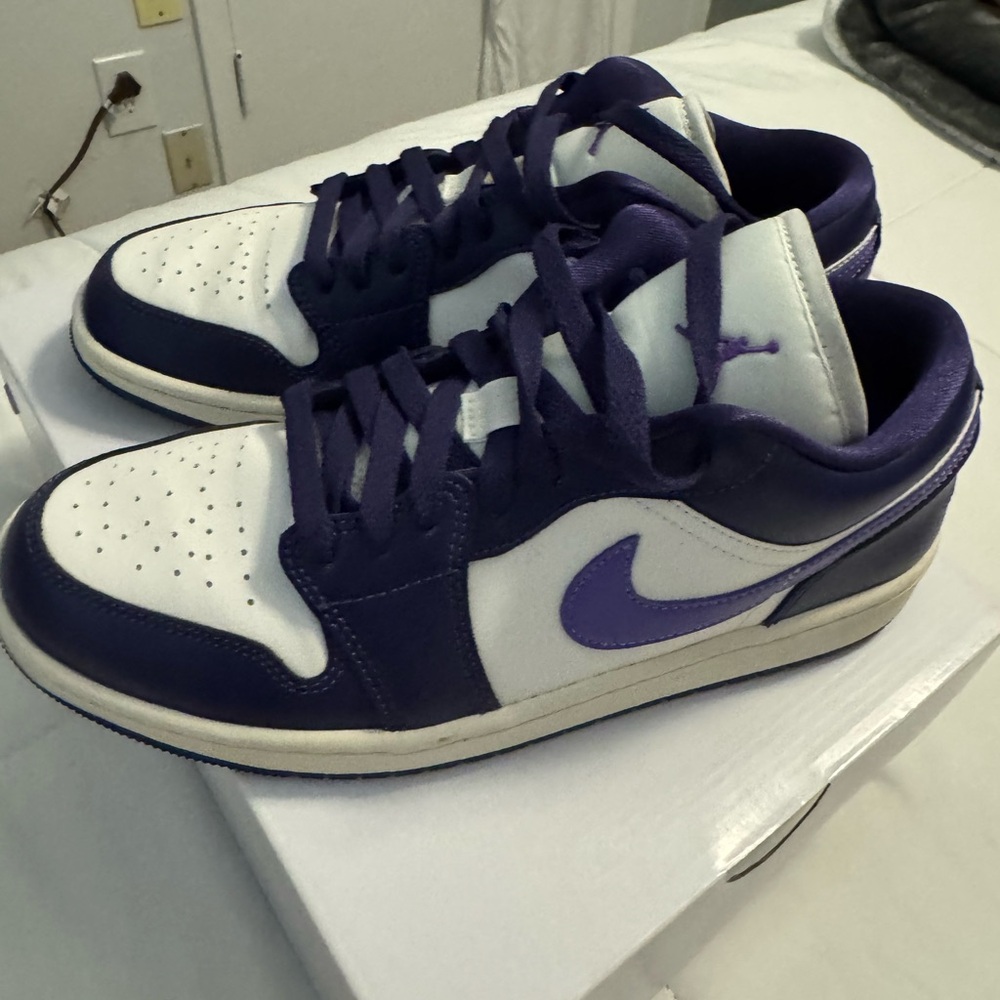 Jordan women’s Purple and White Sneakers